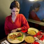 Pushpika De Silva eating nonvegetarian food