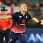 Tom Curran bicep tattoos