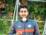 Umar Malik with a ball