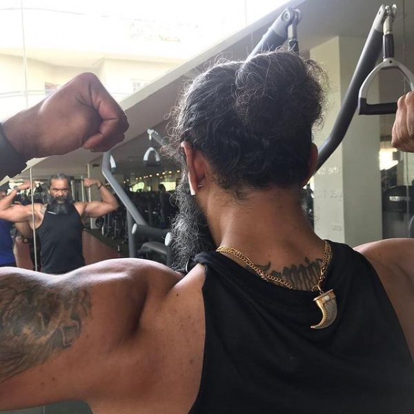 Avinash has a tattoo on his back