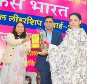 Divya Maderna with her Women Political Leadership Award by Focus India in New Delhi