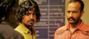 Kishore Kumar G in a still from the Tamil film Polladhavan