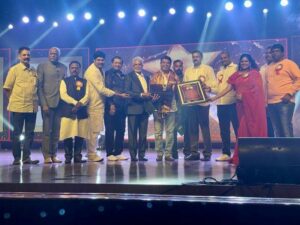 Naresh Babu with his Allrounder award on the completion of 50 years in the film industry