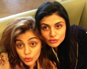 Saima Baloch, along with her sister, Konain Koni Khan (right)