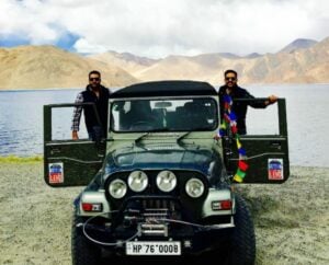 Vikramaditya Singh (right) posing with his Mahindra Thar