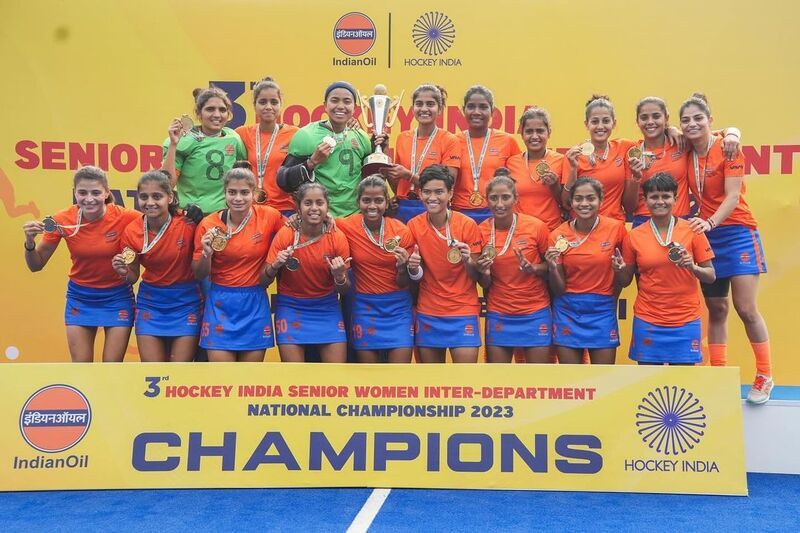 Vaishnavi Vitthal Phalke (top row, fourth from left) after winning the 3rd Hockey India Inter-Department National Championship 2023